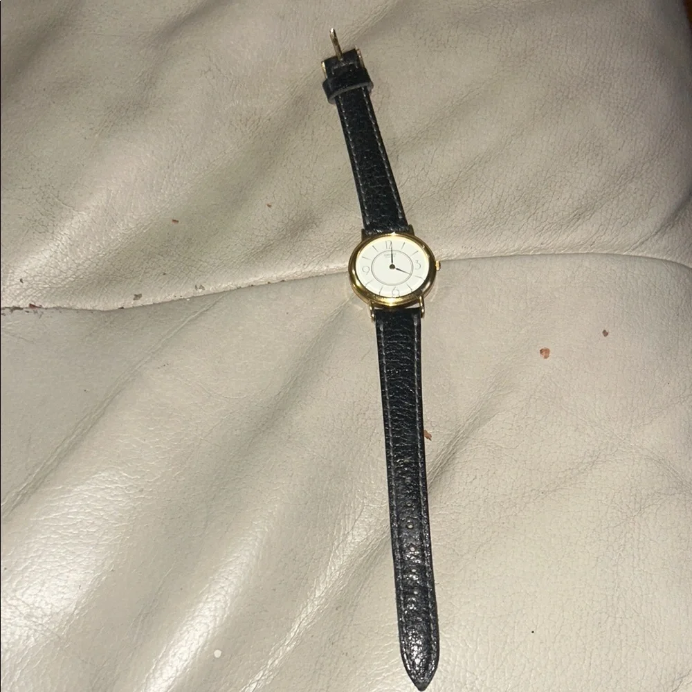 Elegant Black Leather Strap Watch with‎ Gold Accents